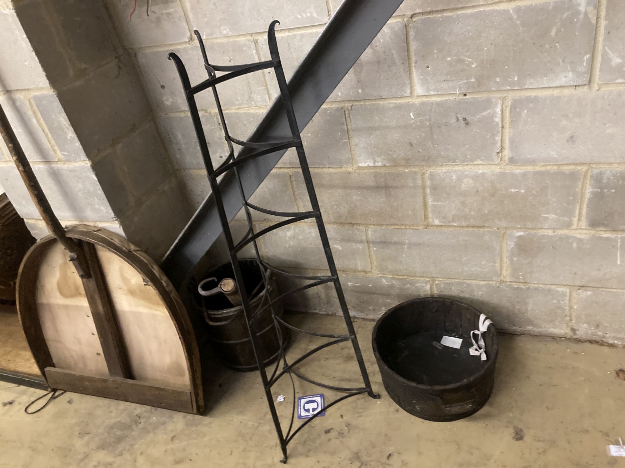 A Victorian mulch shovel, wrought iron pot stand and a yoke